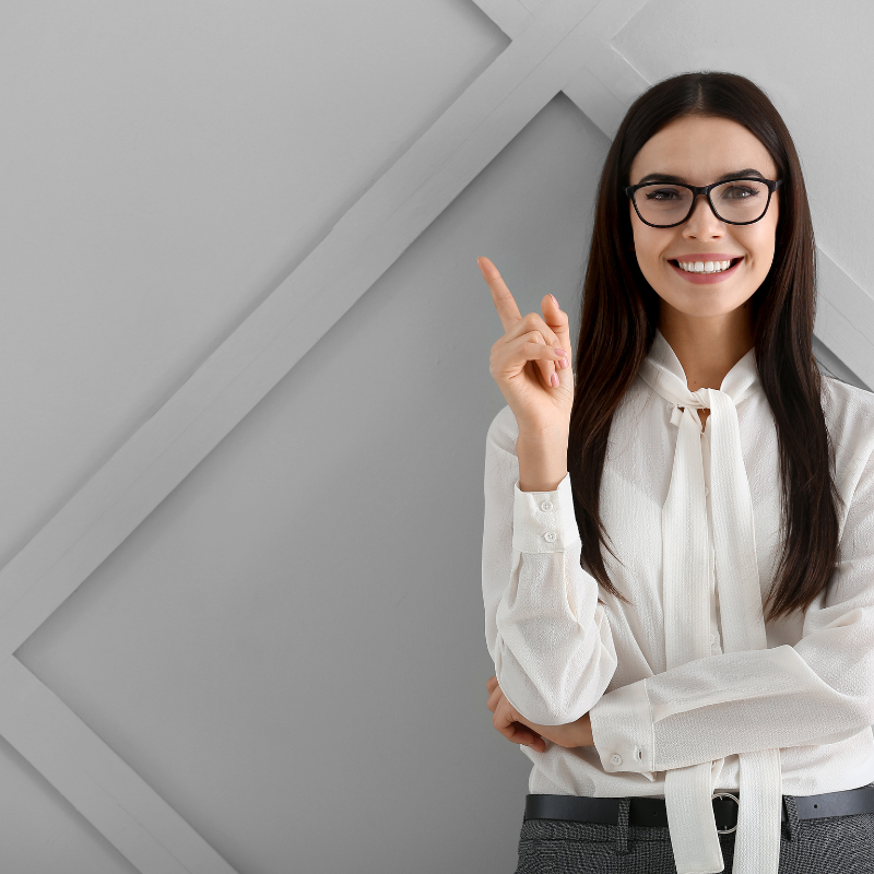 an admin who knows how to use ai safely standing in front of a wall